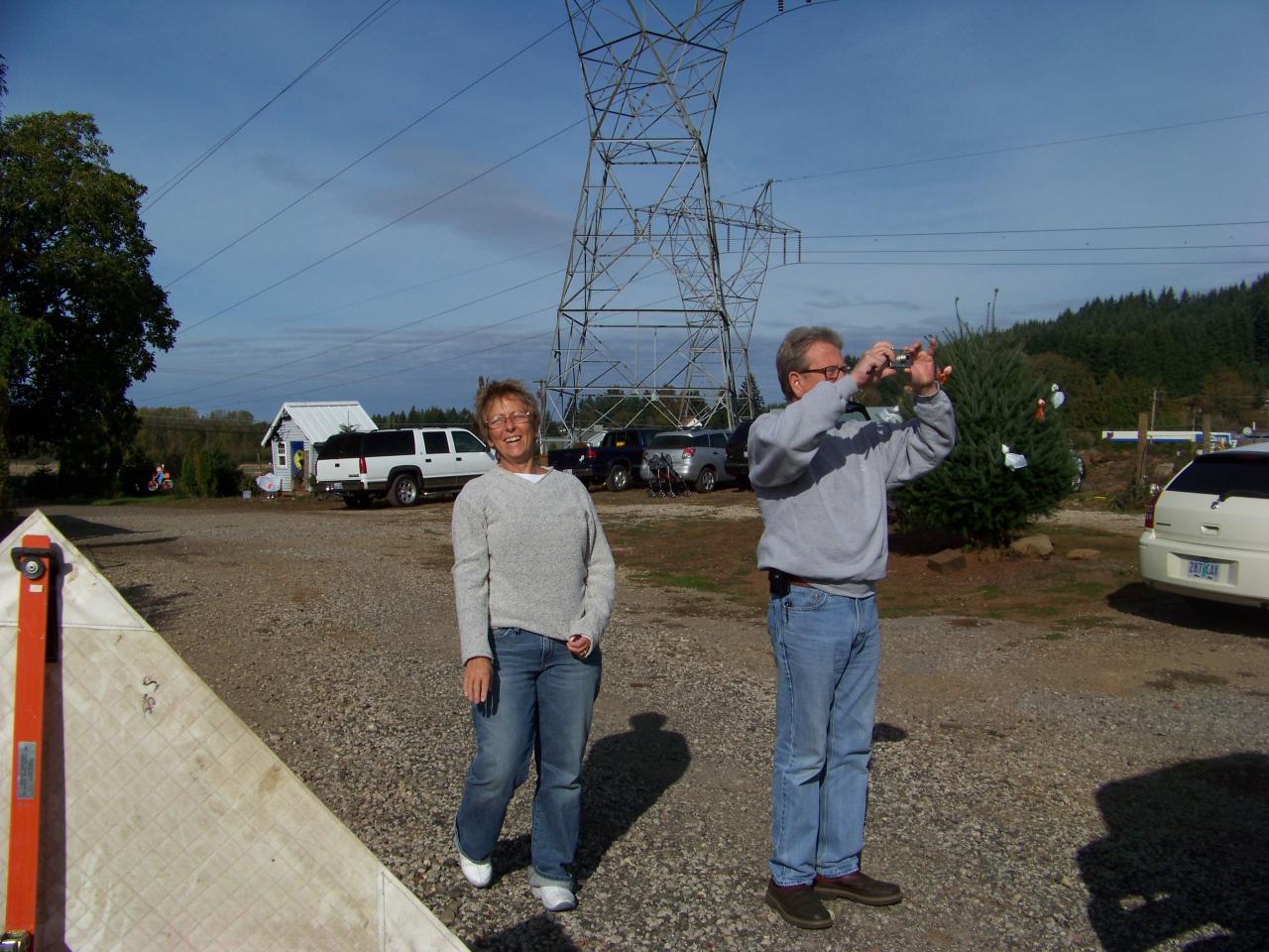 Visitors taking photos in the farm yard